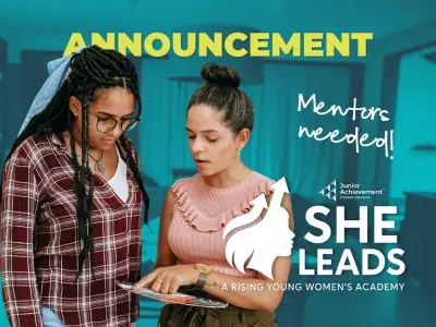 Women showing another women tablet