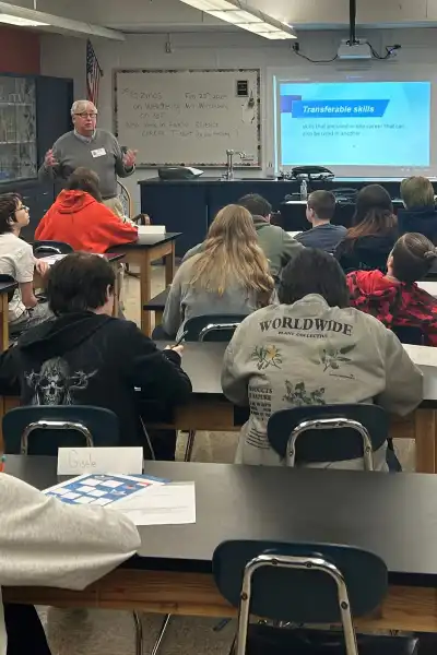 Volunteer teaching a class